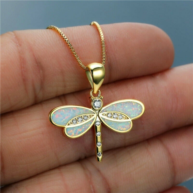 Collier papillon en or avec opale