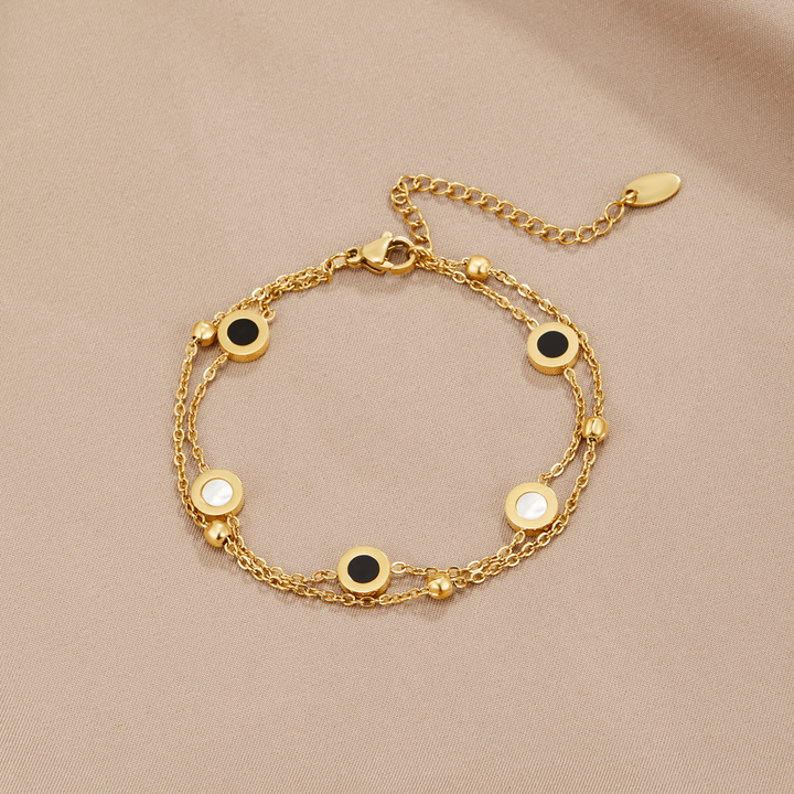 Bracelet en onyx et pierre blanche