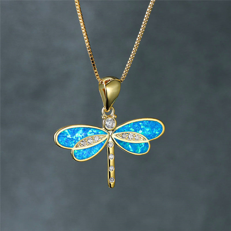 Collier papillon en or avec opale