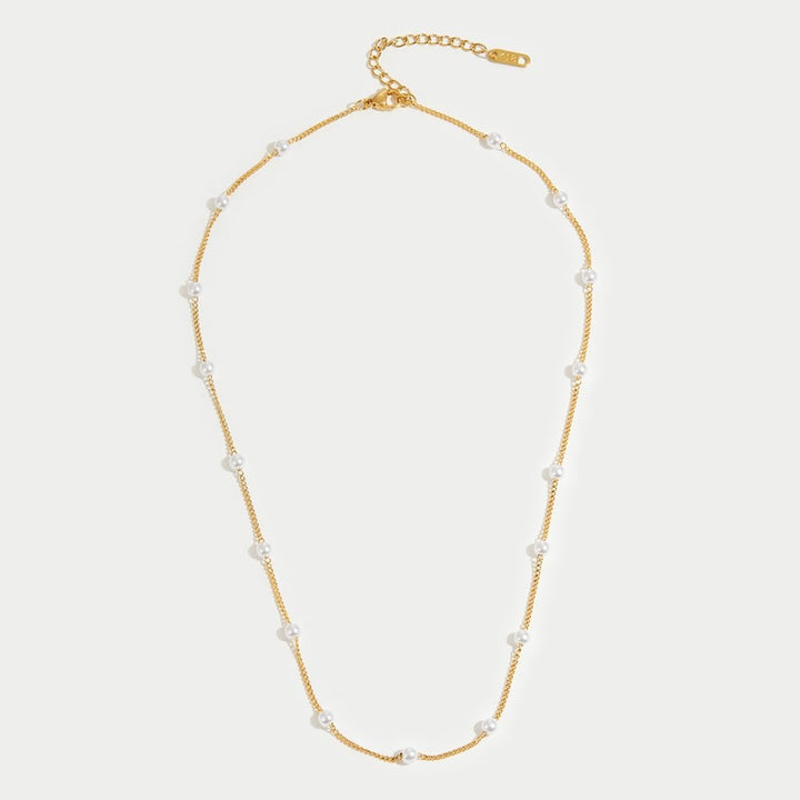 Collier en perles dorées Reine
