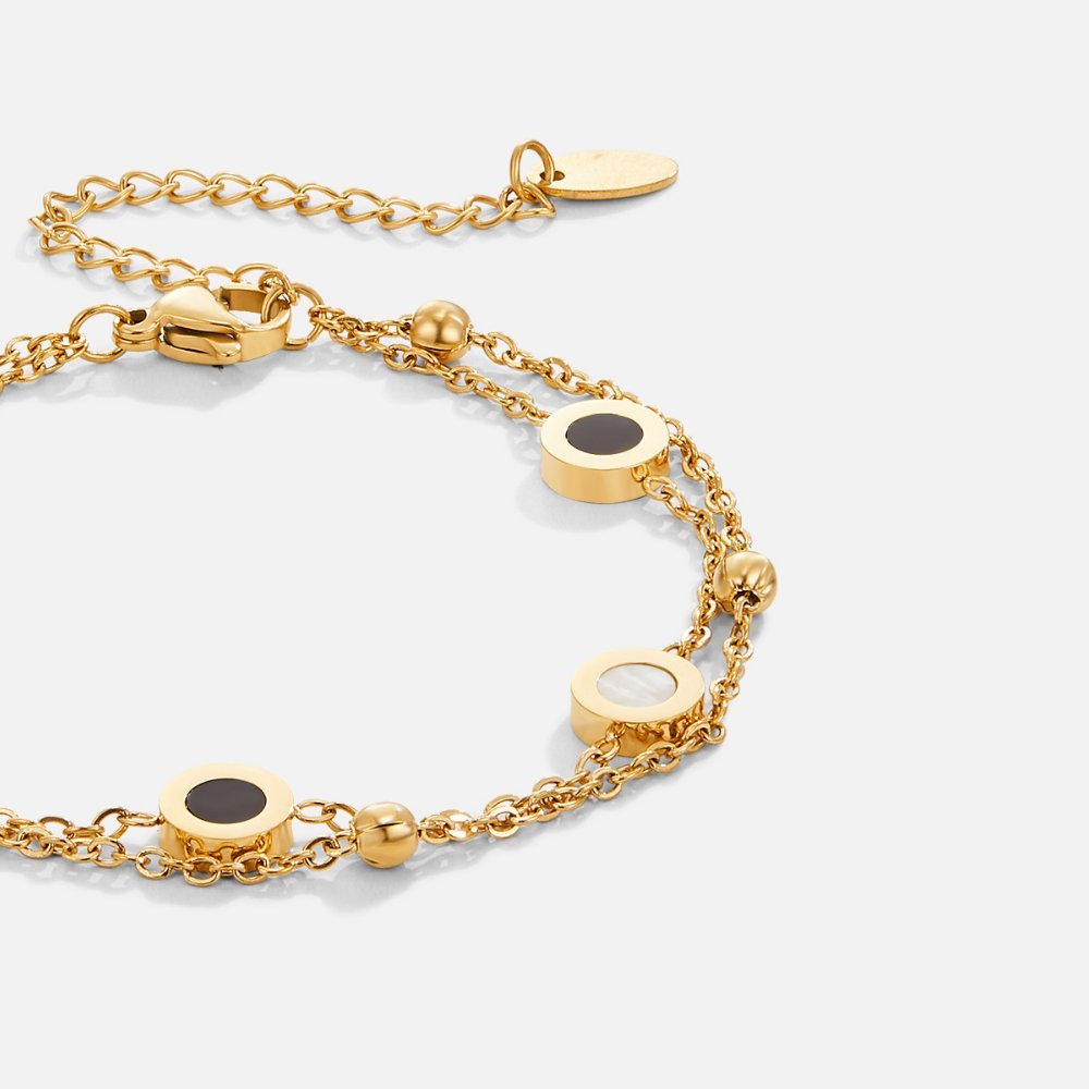 Bracelet en onyx et pierre blanche